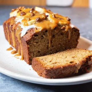 Vegan Peanut Butter Banana Bread served on a wooden cutting board